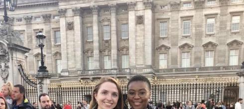 My friend and I in front of Buckingham Palace