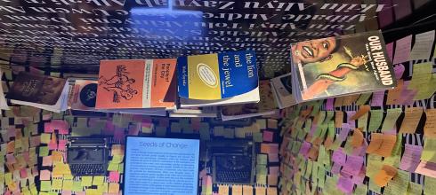 Exhibit showcasing books by Nigerian authors. 