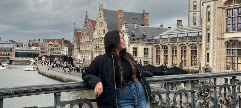 Me in front of a canal in Ghent; Venice is not the only city with canals
