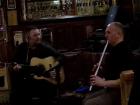 These musicians played traditional Irish music with just a flute and acoustic guitar