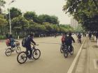 In between classes, students begin to emerge on their bicycles. 