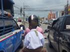 A parent driving their child to school