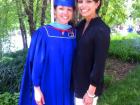 Graduating with my Masters of Arts in Teaching. My sister is next to me. 