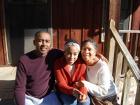 Another older picture of my parents and me sitting on the front porch of my home