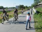 If people bike, it is usually for exercise. Here people are biking along a popular trail in Atlanta called the Beltline