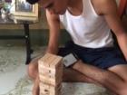 My host brother and I playing Jenga-- he beat me! 