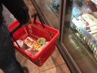 A shopper's basket in line to check out-- not a lot of food items!