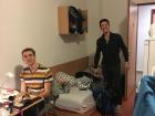 A picture of my dorm room with my two roommates, Jack and Miklos!