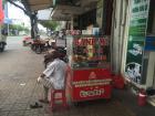 People hang around the banh mi stand all day