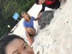 My friends and I say our farewells to a green sea turtle mother as she is returned to the sea