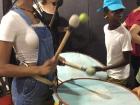 I learned how to play the drum from students in a band