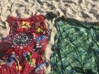 These giant pieces of colorful fabric are called cangas. They are used on the beach or can be styled as a skirt or dress