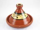 Example of a Tajine: Inside is meat and vegetables 