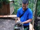 The Sloth had clenched a branch in hand while I was barely holding it!