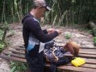 Balu liked to try to climb into backpacks and stole that black tarp to hide under! Our guide, Nay, was entertained too. 