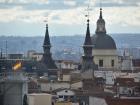 Several churches and rooftops can be seen from El Corte Ingles (a large convenience store)