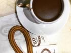 Famous dessert in Madrid - churros with a teacup full of warm chocolate
