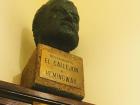 A bust of american author, Ernest Hemingway, whom would write at this very restaurant