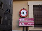 A sign for width limit due to narrow streets. What is this in feet? 
