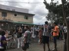 Before the Atlético Mineiros soccer game, all of the fans gather in local restaurants to celebrate with one another