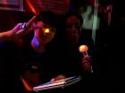 Attempting to sing a Korean song at a noraebang (Korean karaoke) with my host brother
