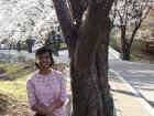 Posing on the walkway by the cherry blossom farm