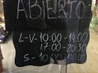 This shows the practice of the siesta. On this sign you can see that L-V (lunes — viernes or Monday — Friday) has two times, one in the morning and the other in the afternoon. We use military time here!