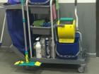 This is an example of the carts that community employers carry throughout the day. Sometimes the mop is not a part of it, though! Those are only for people that clean inside of organizations, apartments, etc. 