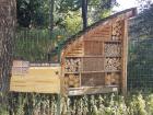 This little wooden house is called a Bee Hotel, where wild bees spend the night to rest up before a long day of nectar gathering!