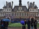 Even in the rain, Parisians and tourists came to visit the memorial