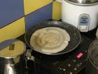 The dosai is flipped and almost ready to be eaten
