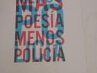 A Spanish protest poster that translates to "More Poetry, Less Police" in English