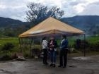 A few women chatting near the sancocho cooking tent 