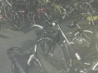 Bikes locked up for the night at a train station