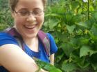 Interacting with wildlife (a chameleon) in Tanzania