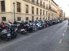 Parking spaces dedicated for mopeds near many businesses 