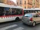 A bus traffic jam, typical in Granada because of the narrow streets