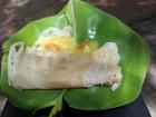 Serving food on a banana leaf is a cultural tradition in India.