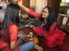 My older sister Suraksha is giving Tika to my younger sister Sujata