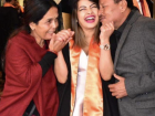 My sister on her graduation day with Mom and Buwa