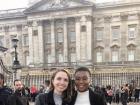 My friend and I in front of Buckingham Palace