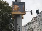 Sign with upcoming trams