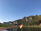 A German flag and the Elbe Sandstone Mountains