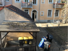 Taking the bins from the courtyard out to the curb
