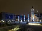 The national colors of Estonia shining brightly in Freedom Square outside the museum