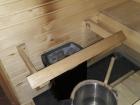 The two most essential parts of a sauna - the stove and the water bucket