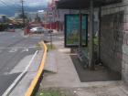 The sign reads "Parada de autobuses" or "bus stop". Besides the sign in Spanish, does this bus stop look like the ones you're used to?