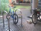 Two bikes outside of the school of biology at my university. A lot of young people ride bikes. Cheaper and better for the environment!
