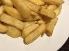 These are British "chips" or fries as we refer to them; thin cut fries aren't as common here, so you'll mostly find thick-cut potatoes in pubs 