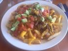 Loaded fries from a soda in Heredia - they had cheese, steak, avocado and tomatoes